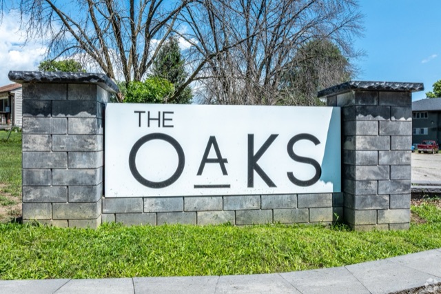 The Oaks entrance sign on SE 5th Street